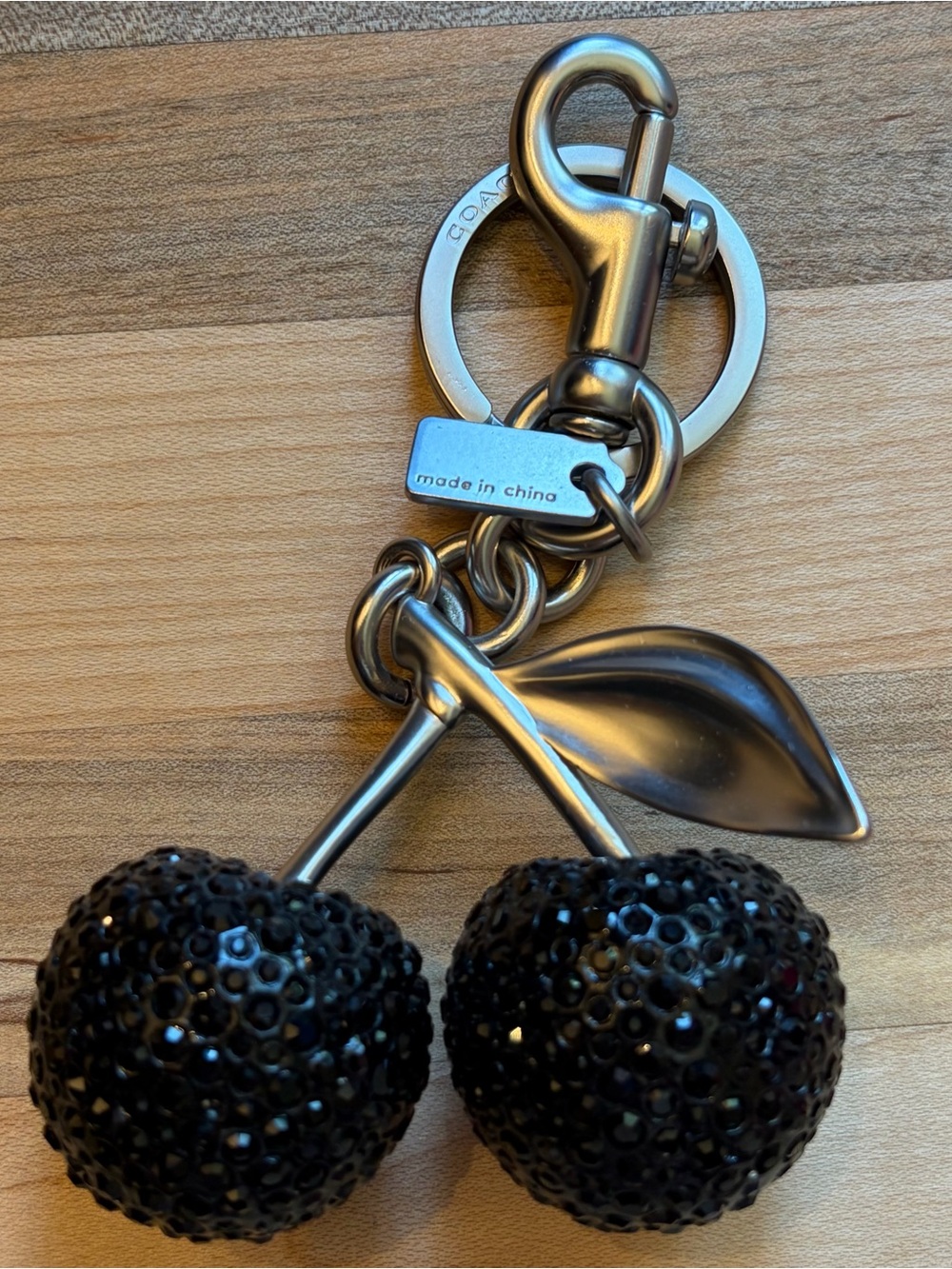 Coach Black Crystal Cherry Keychain with Gunmetal Hardware